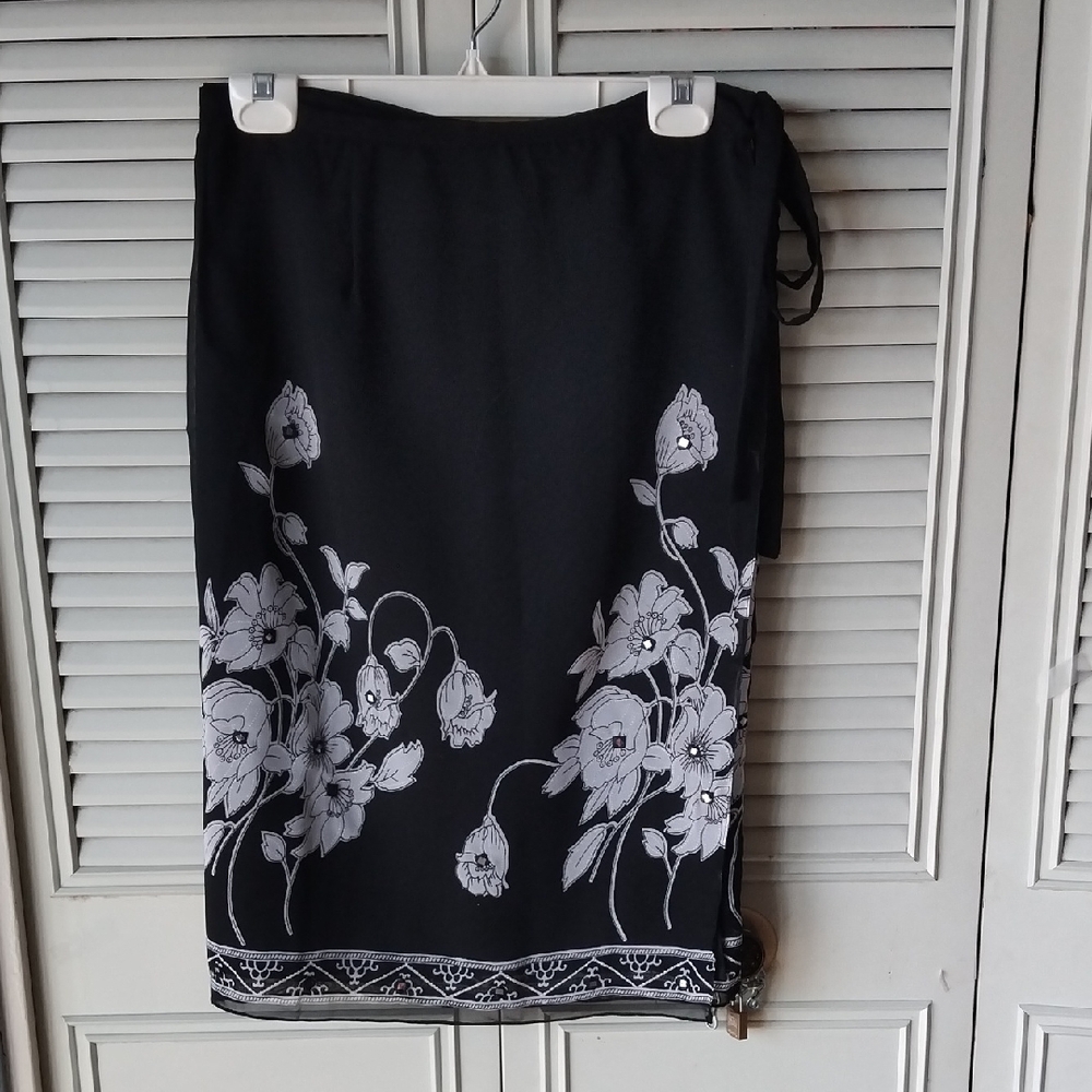 Black WrapSkirt with White Floral Print And Sparkly Rhinestones.